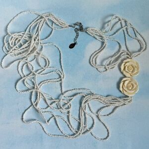 LAILA ROWE Necklace Multiple Length Strands White Seed Beads & Two Carved Roses